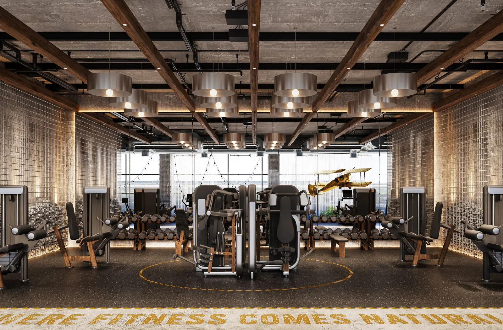 Raw Theory gym with timber beams and strength machines