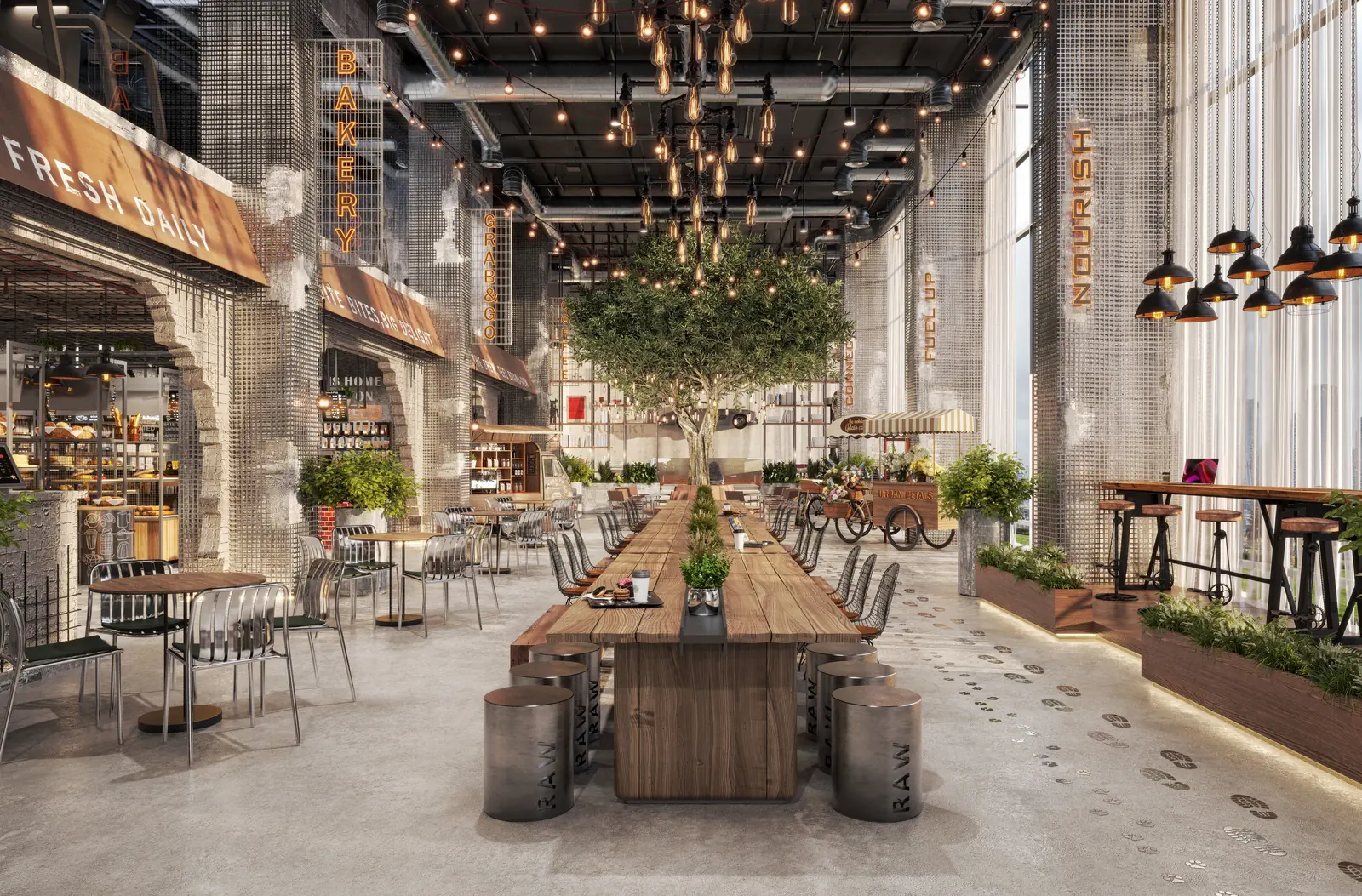 Distrikt Table, a long communal dining table under hanging lights and a tree