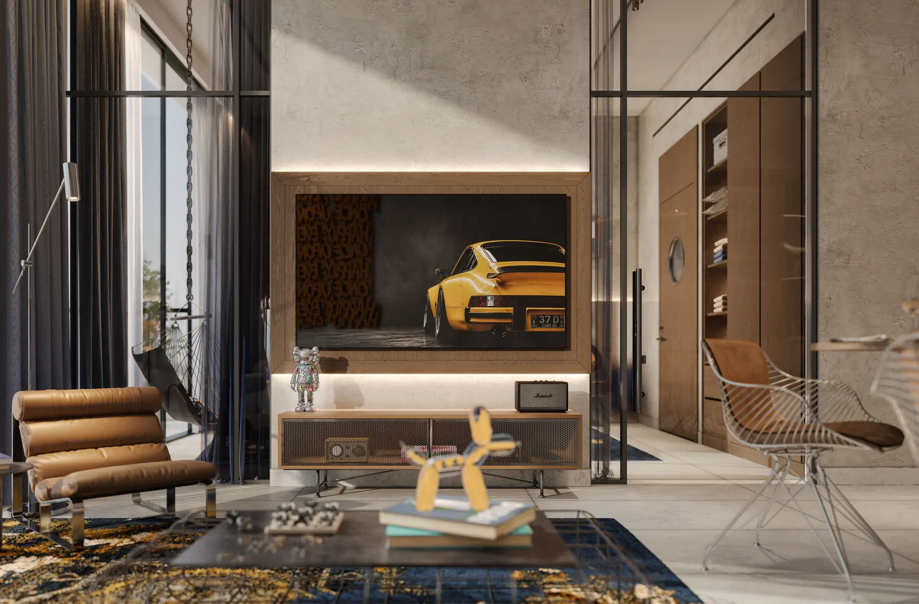 One-bedroom living room with a leather lounger and a Ferrari artwork on the wall